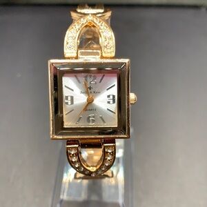 3/$30. Bella and Rose rose gold ladies watch